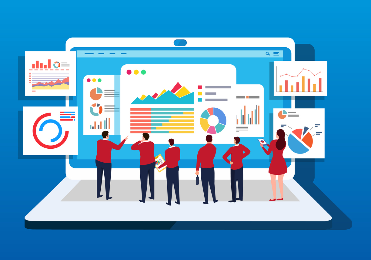 A group of businessmen study data in front of a computer